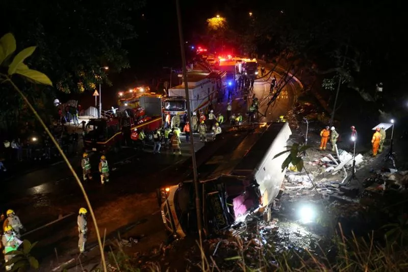 Double decker bus overturned in Hong Kong - Sakshi