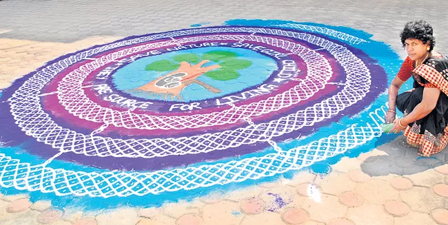 chittoor woman record muggu with 10,000 dots - Sakshi