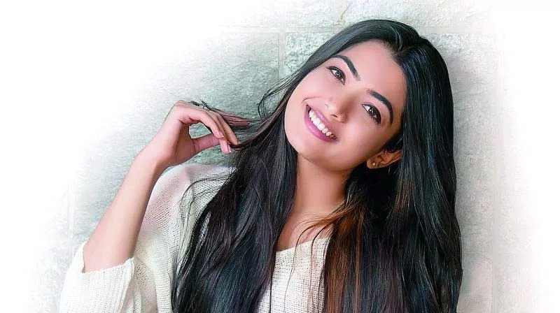 Rashmika attends her first Bhootha Kola with fiancé Rakshit - Sakshi