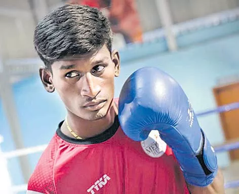 kakara shyam kumar quarter final jakarta boxing tournaments - Sakshi