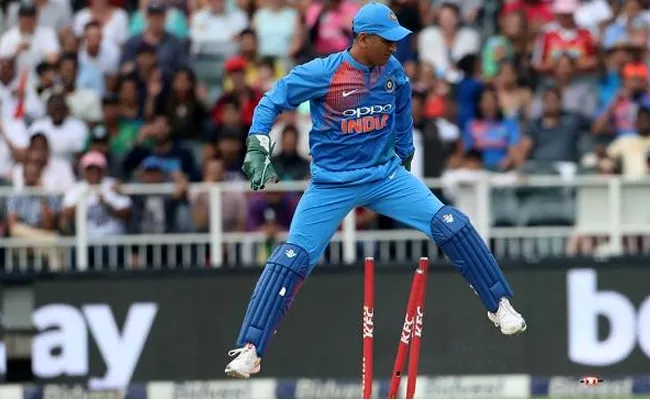 MS Dhoni breaks world record for most catches by wicketkeeper in T20 cricket - Sakshi