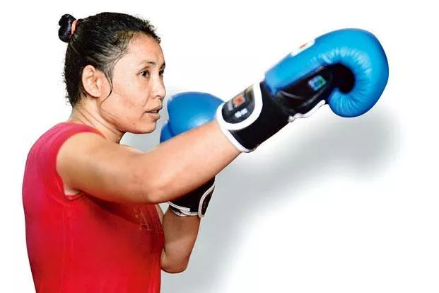 boxer sarita devi enter to quarters - Sakshi