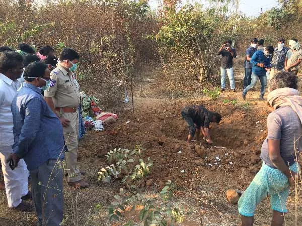 woman Dead Body Dug Out From Grave For Postmortem - Sakshi