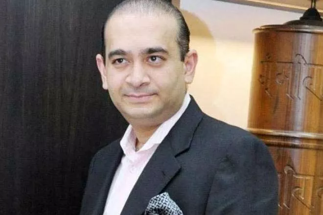 PNB fraud: ED freezes deposits, shares worth Rs 44 cr of Nirav Modi group - Sakshi