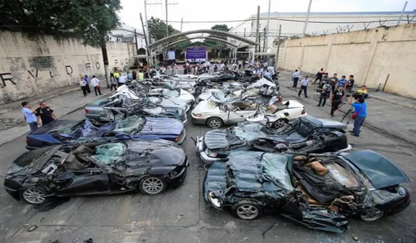 Duterte Crushes Luxury Cars in Graft Warning - Sakshi