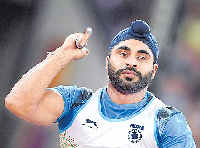 Top Indian javelin thrower fails dope test again, right before Indian - Sakshi