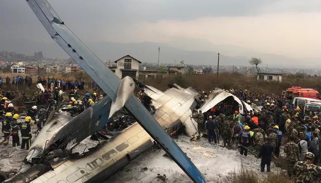 US-Bangla Airline plane crashes at Nepal's Kathmandu Tribhuvan International Airport - Sakshi