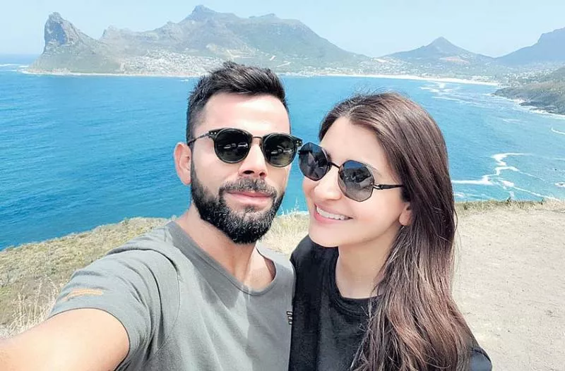 Virat Kohli and wife Anushka Sharma get invite from Sri Lanka sports minister to visit country for holiday - Sakshi