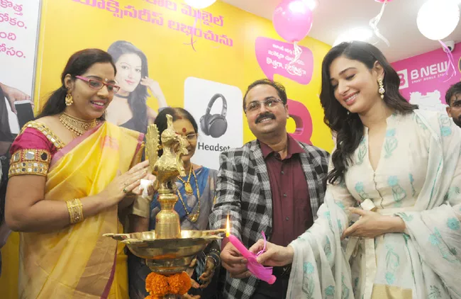 tamannaah launches binue smartphone showroom in vizianagaram - Sakshi