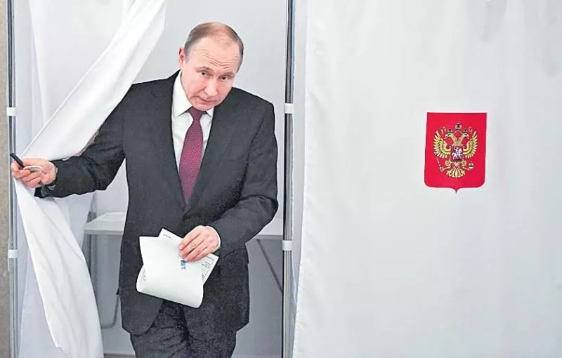 Russia's Vladimir Putin retains grip on power, exit poll shows  - Sakshi