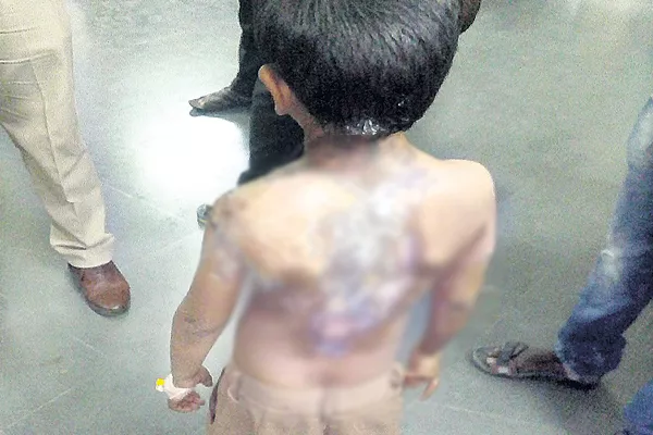 Woman Poured hot water on child baby - Sakshi