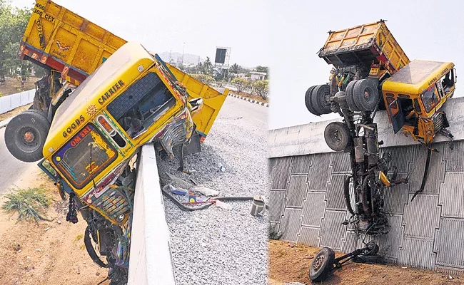 Tipper Lorry Hanging On Bridge - Sakshi