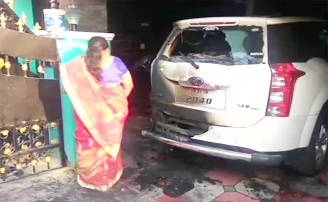 Petrol bomb hurled at BJP district chief house - Sakshi