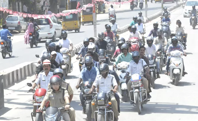 Traffic Police Helmet Awareness Rally - Sakshi