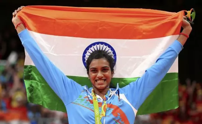 PV Sindhu To Be The Flag Bearer In Commonwealth Games - Sakshi