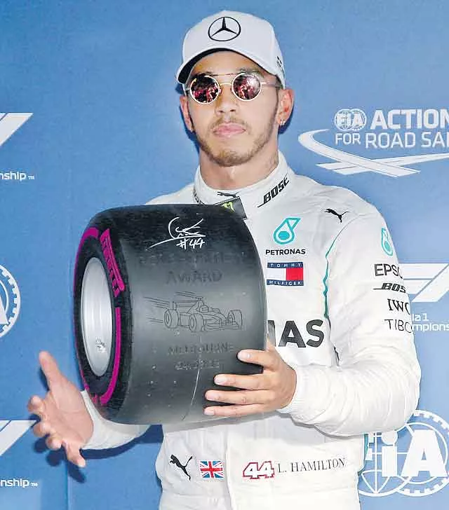 Imperious Hamilton beats Raikkonen to pole - Sakshi