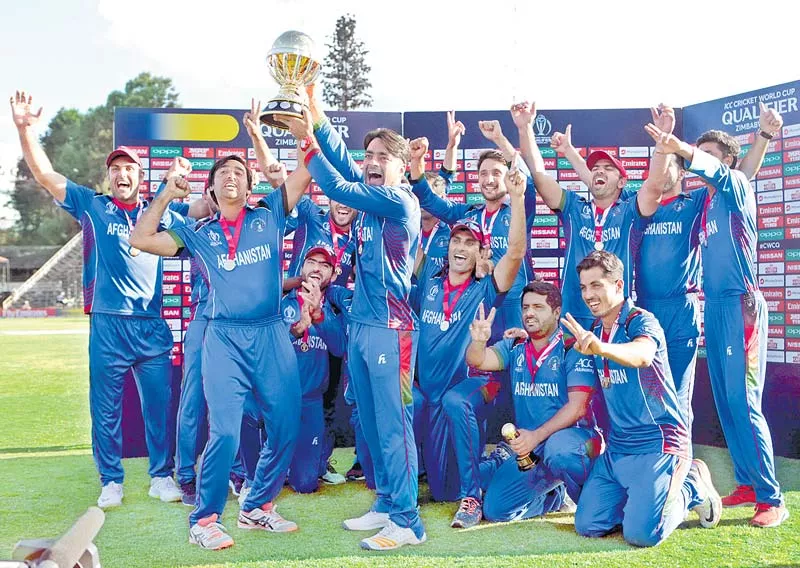 Afghanistan thrash West Indies to win ICC World Cup qualifying final - Sakshi