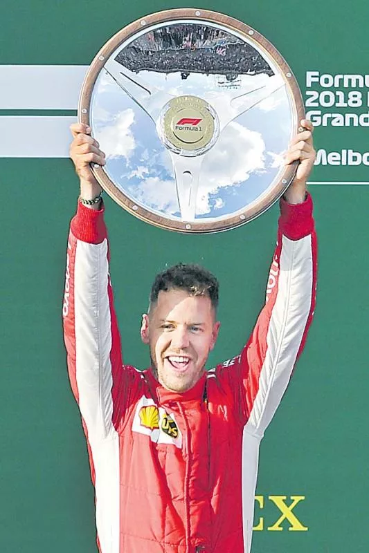 Sebastian Vettel stuns Lewis Hamilton to win in Melbourne - Sakshi