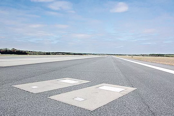 Tombs on Airport Runway in America - Sakshi