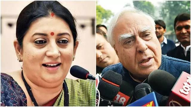 Smriti Irani targets Kapil Sibal on land deal - Sakshi