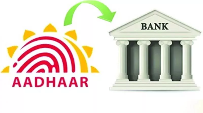 80% bank accounts, 60% mobile connections linked with Aadhaar - Sakshi