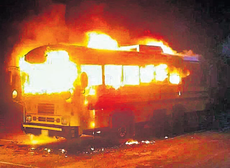 Maoists burned 2 buses - Sakshi