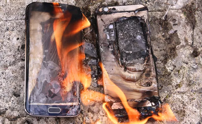 school management burns many phones in dhaka - Sakshi