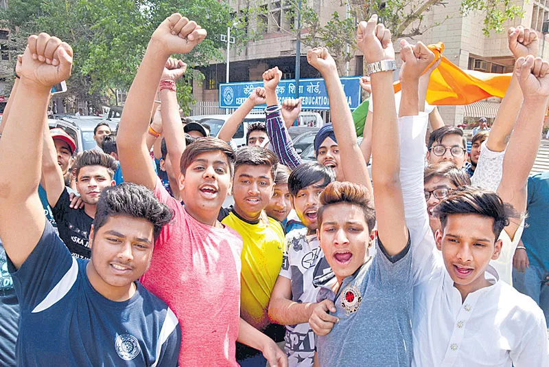 Agitated students protest outside office in Delhi - Sakshi