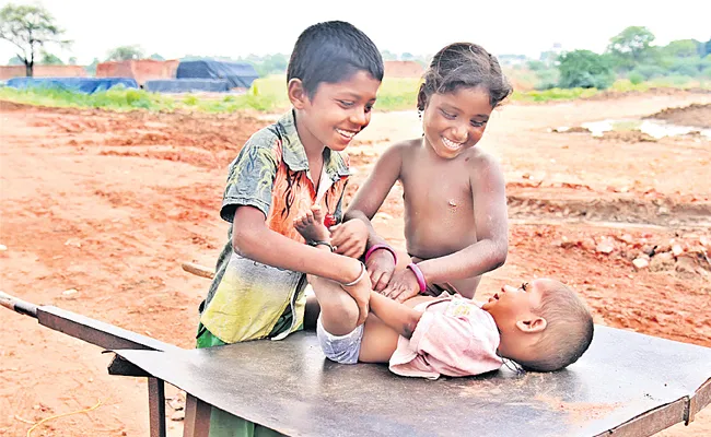 Brother And Sister Play With Kid - Sakshi