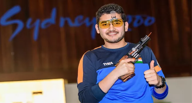 Anish Bhanwala Breaks Record After Winning Gold At CWG - Sakshi