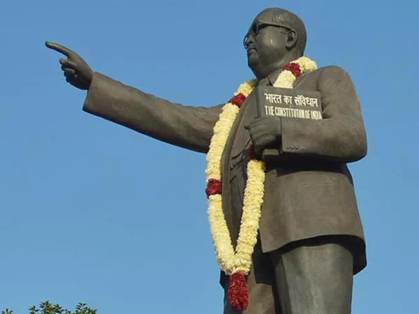 Dalit Members Cleanse Ambedkar Statue After Tributes By Union Minister Maneka Gandhi In Gujarat - Sakshi