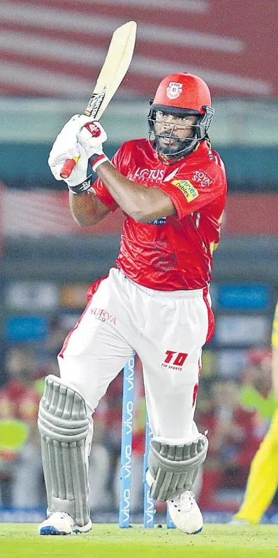 Punjab hold on to win by four runs despite MS Dhoni heroics - Sakshi