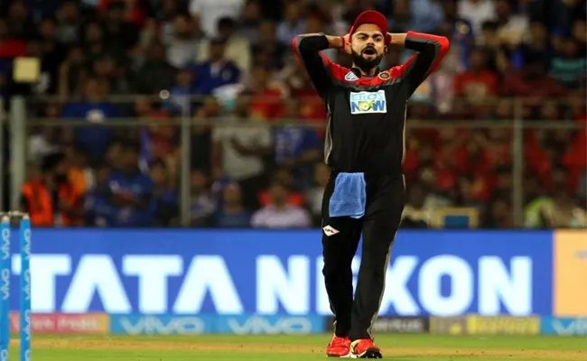 Virat Kohli Gets Angry And Shook His Head On Umpire Decision - Sakshi