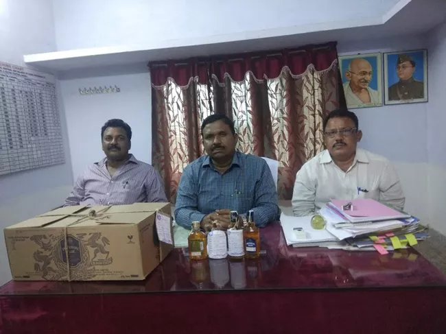 Excise Officials Seized Fake Liquor Bottles - Sakshi