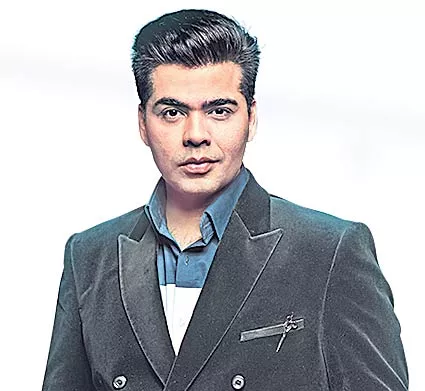 Karan Johar Is First Bollywood Filmmaker To Get Wax Statue At Madame Tussauds - Sakshi