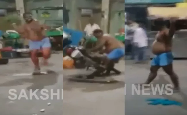 Half Naked Drunk Employee Of TTD Assault In Tirupathi Video Goes Viral - Sakshi