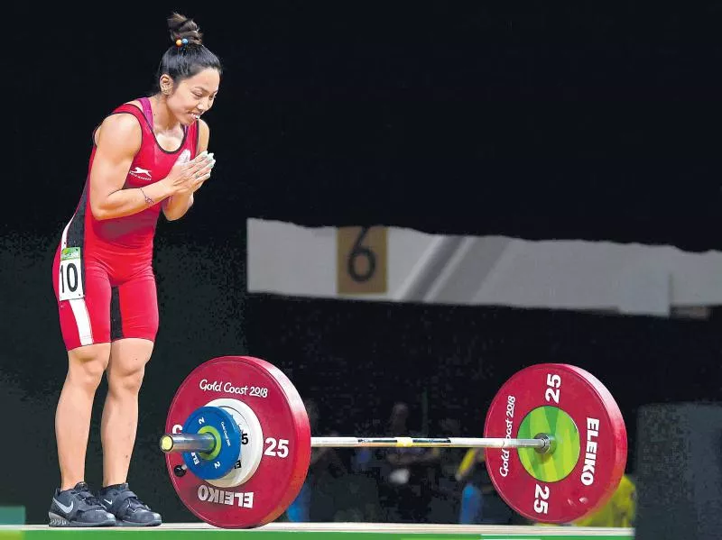 Saikhom Mirabai Chanu smashed CWG weightlifting landmarks - Sakshi