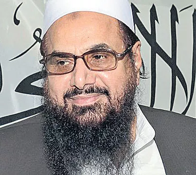 Lahore Court asks government not to harass Hafiz Saeed - Sakshi