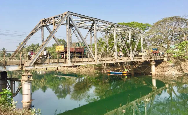 Delta Canal Bridge Danger Bells - Sakshi