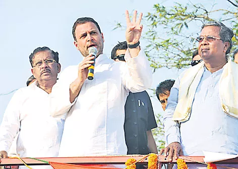 Rahul Gandhi calls Amit Shah's equating opposition with animals - Sakshi