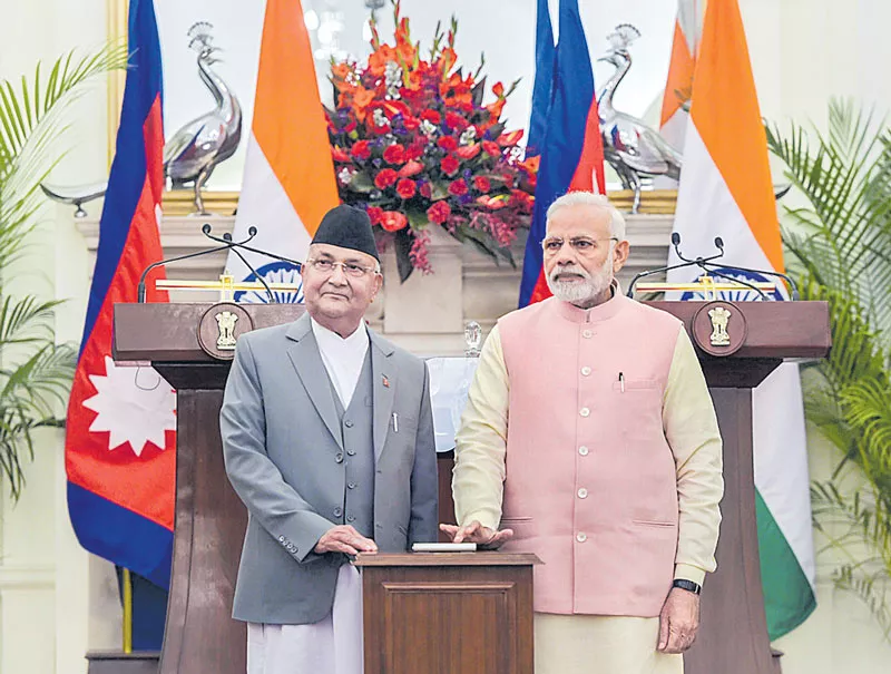 PM Modi Meets Nepali Counterpart KP Oli Ahead of Bilateral Talks - Sakshi