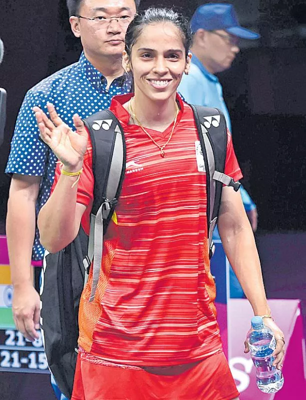 Saina stars as India enter badminton mixed team finals at CWG - Sakshi