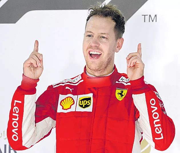 Sebastian Vettel pips Lewis Hamilton to win Bahrain Grand Prix - Sakshi