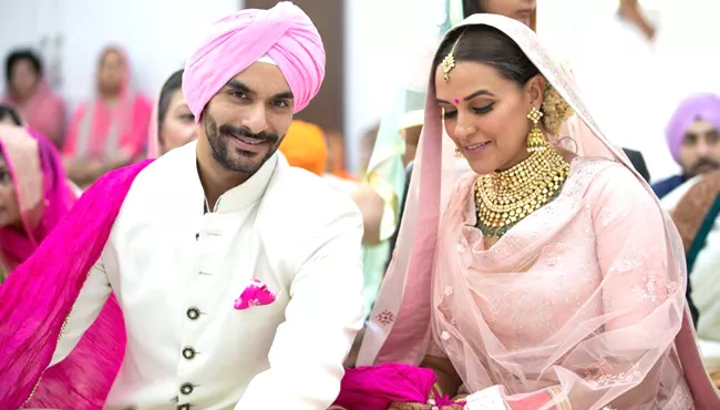 Neha Dhupia ties the knot with Angad Bedi - Sakshi