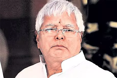 Lalu Prasad Yadav granted three days parole to attend son Tej Pratap’s marriage - Sakshi