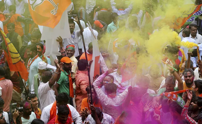 BJP Workers Begin Colourful Celebrations - Sakshi