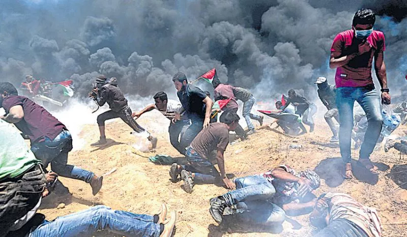 Israeli forces kill 55 in Gaza clashes as US opens Jerusalem embassy - Sakshi