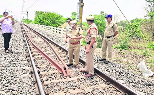 Cement bricks on railway track - Sakshi