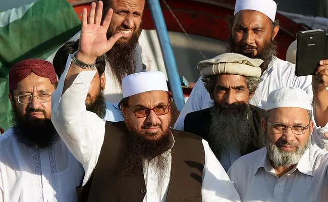 Pakistan Restores Security of JuD Chief Hafiz Saeed - Sakshi