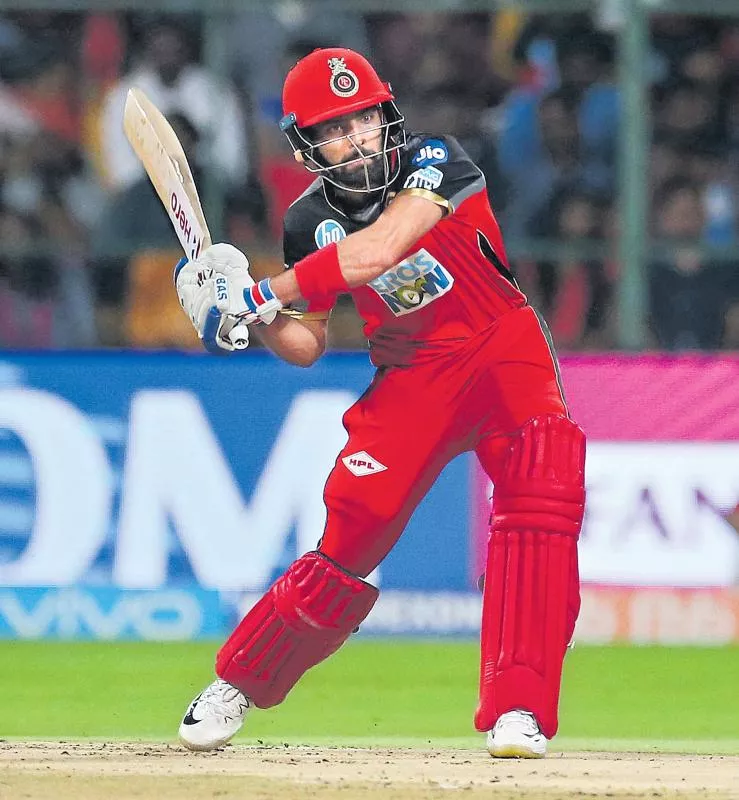 Royal Challengers Bangalore won by 14 runs - Sakshi